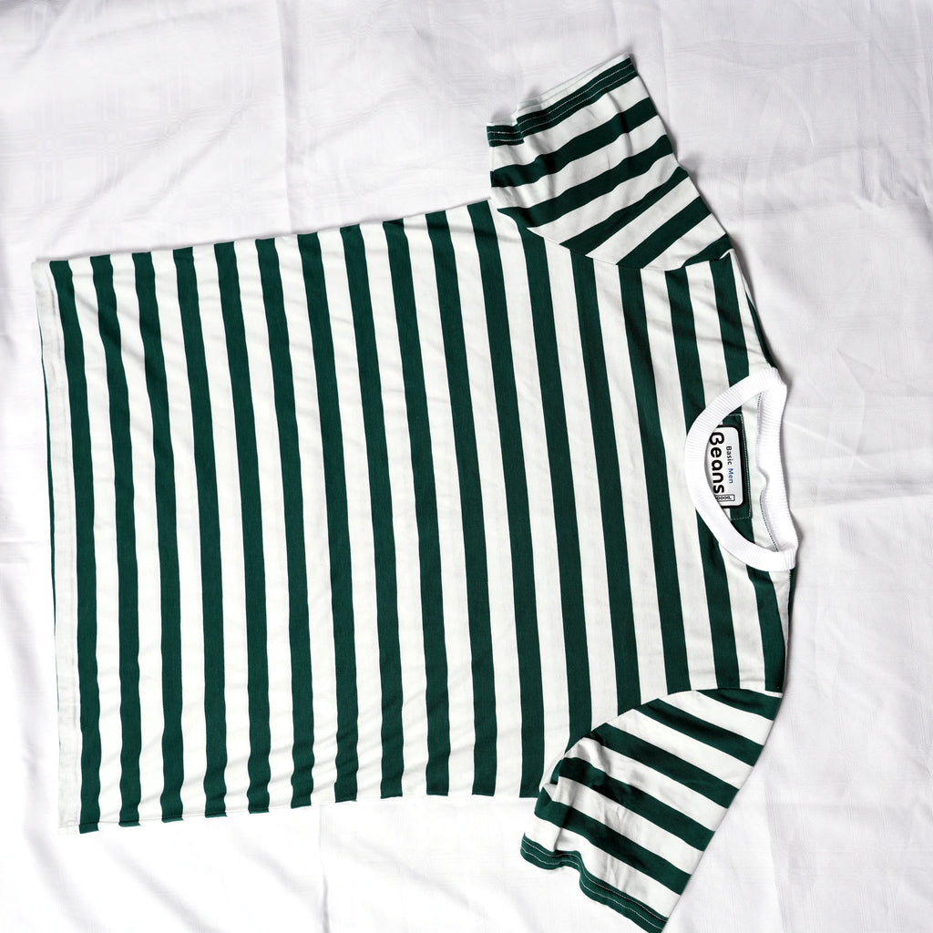 Beans green and white striped men's t-shirt laid flat on white backdrop.