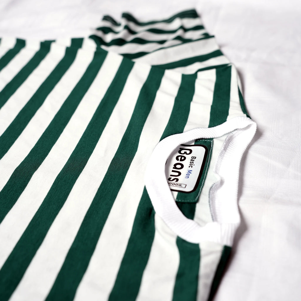 Beans green and white striped men's t-shirt laid flat on white backdrop.